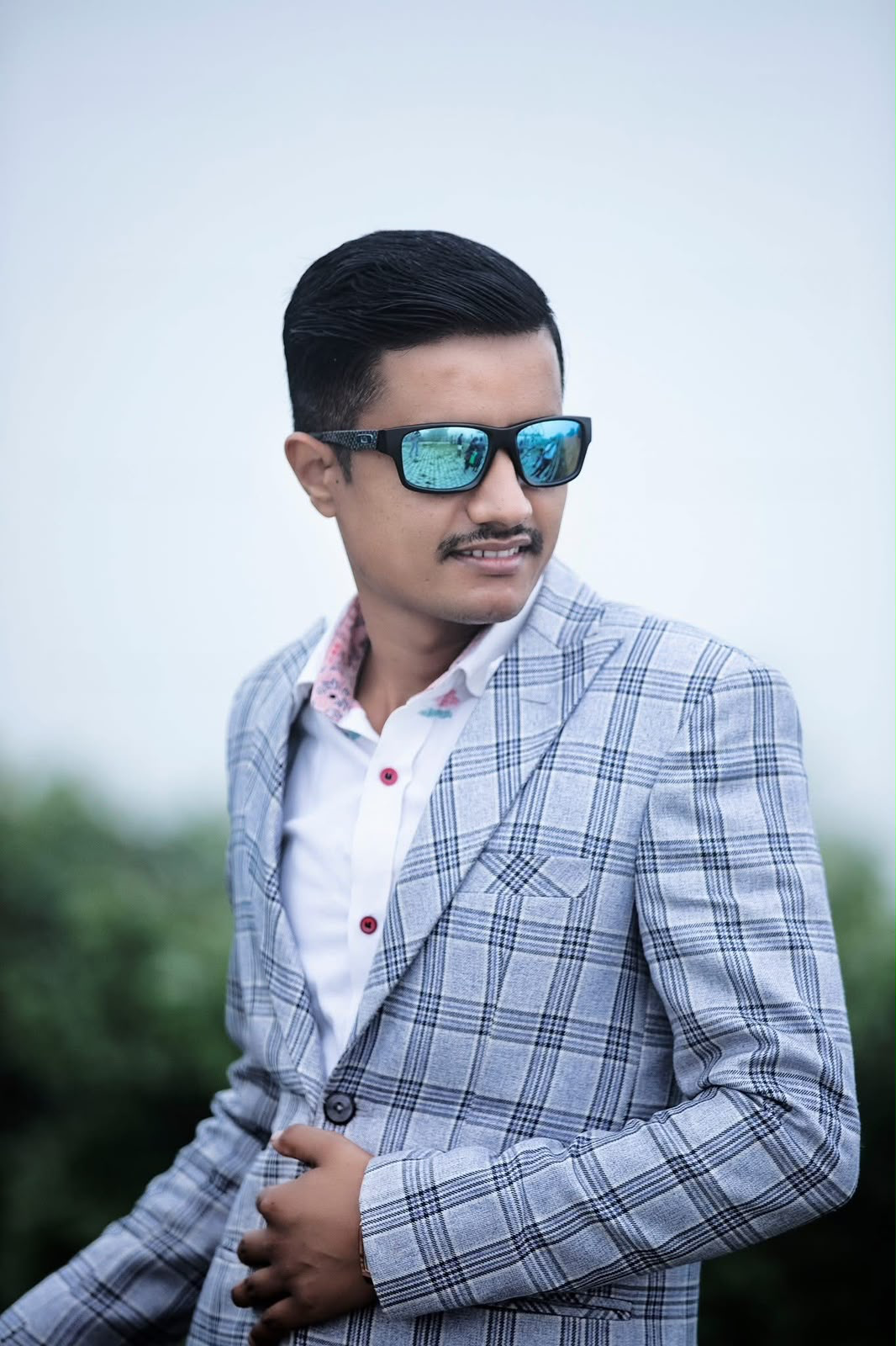 Portrait of Prakash Basnet, Founder & Senior Business Advisor of Pragati Venus Uniform